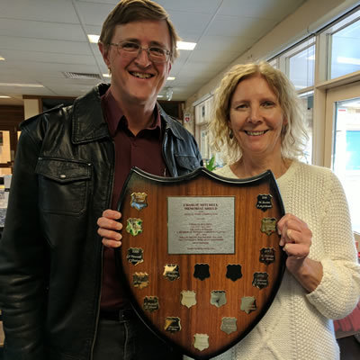 Photo of the winners with the shield