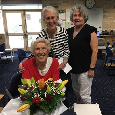 Photo of Betty and flowers