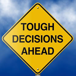 Image of tough decision sign